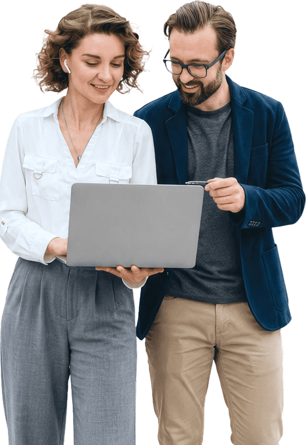 Two product engineers collaborating over a laptop