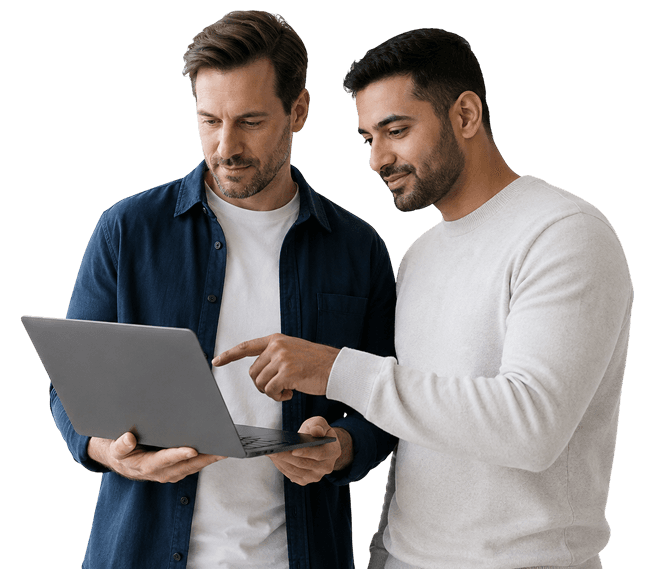 Two engineers reviewing a product roadmap on a laptop